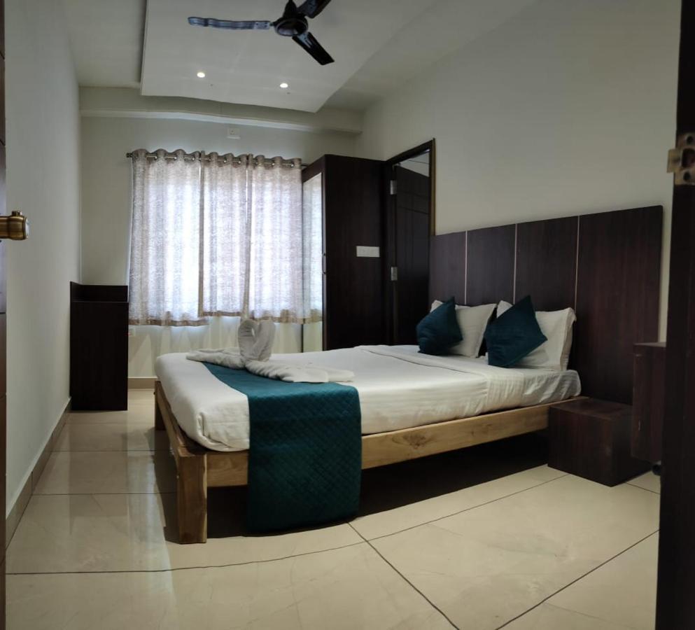 Quince Elite Hotel Mysore Ruang foto