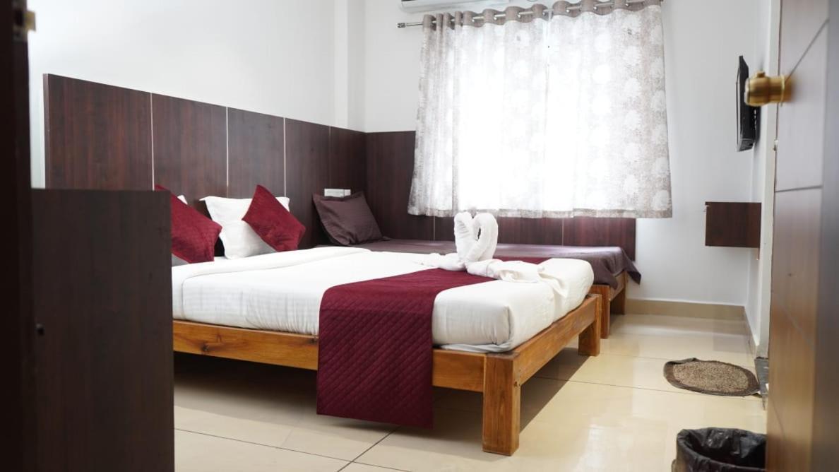 Quince Elite Hotel Mysore Ruang foto